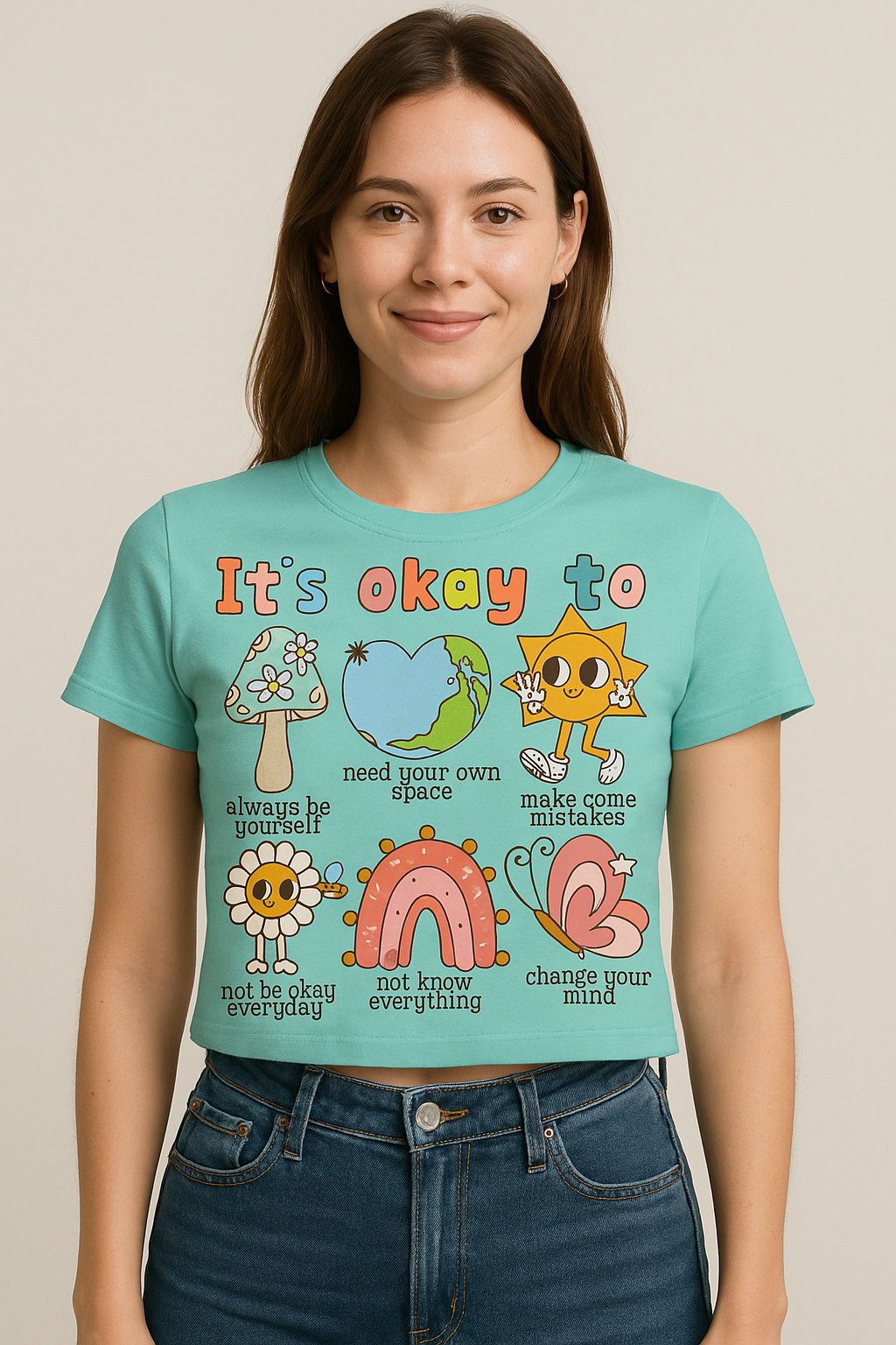 Mental Health Crop Tee featuring positive messages on a turquoise background.