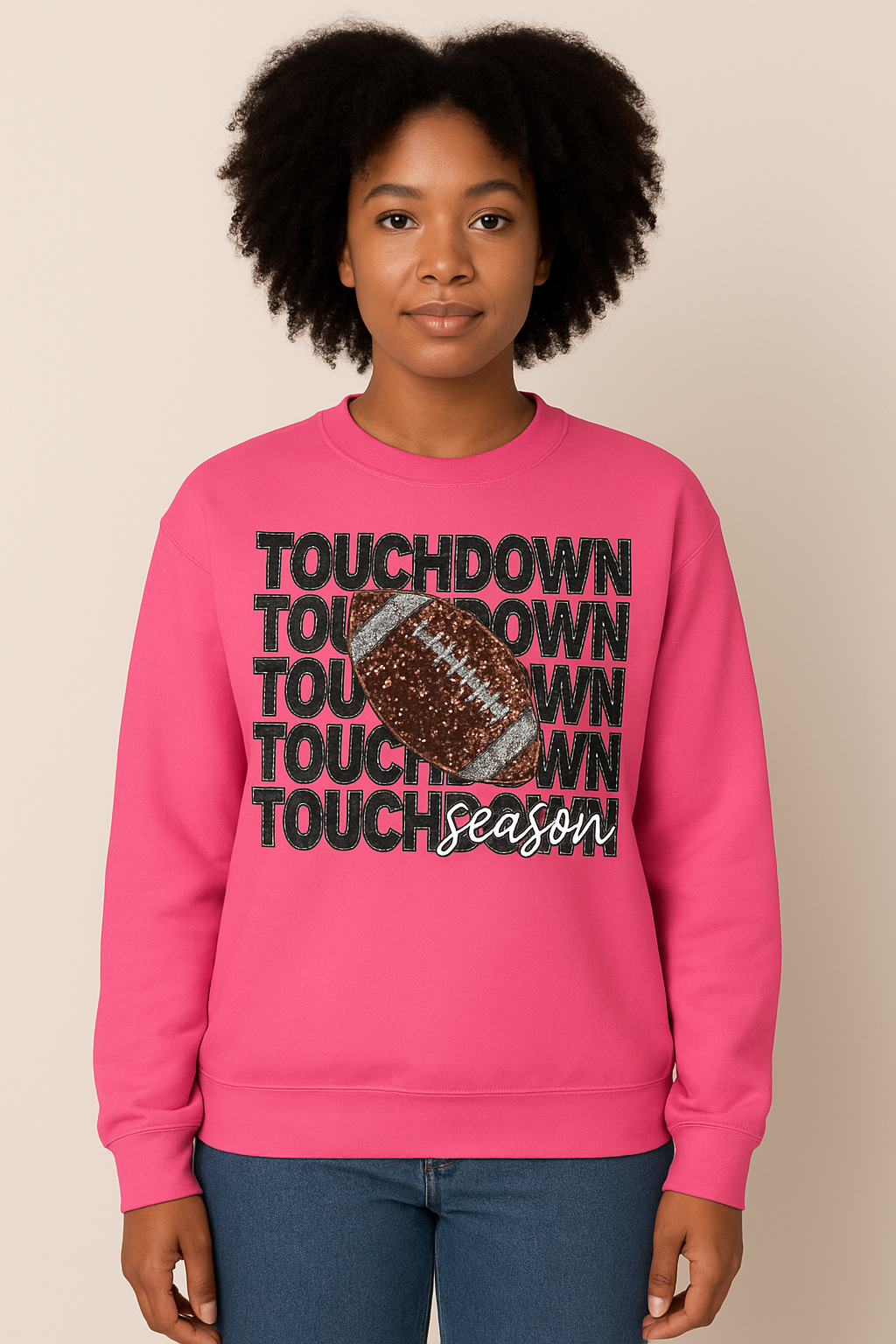 Touch Down Season Sweatshirt in pink featuring bold text and a football graphic, perfect for football fans.